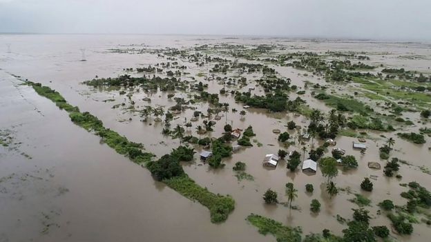 Picture released by the UN World Food Programme on March 20, 2019, shows an aerial view of flooded houses, after the tropical cyclone Idai made landfall near the Mozambican port city of Beira