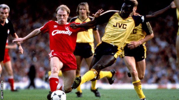 Arsenal's Michael Thomas tackles Liverpool's Steve McMahon