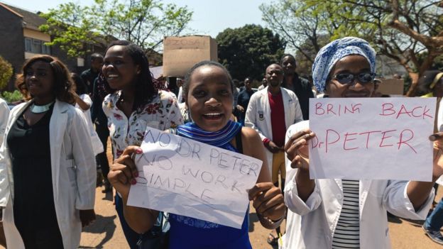 Doctors pictured marching in Zimbabwe on Monday