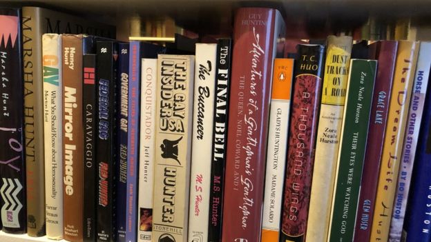 Books on a shelf, some of the books in the LGBT+ collection being sent to the University of London.