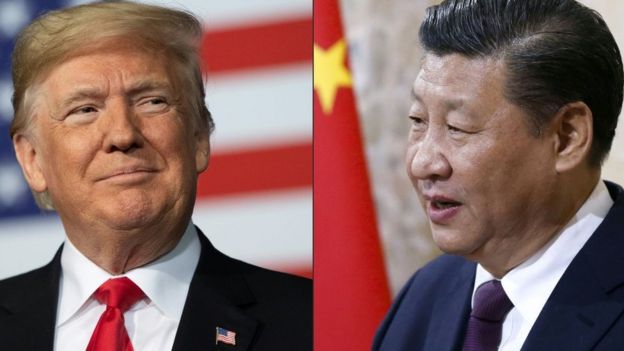 This combination of pictures created on May 14, 2020 shows recent portraits of China's President Xi Jinping (R) and US President Donald Trump.