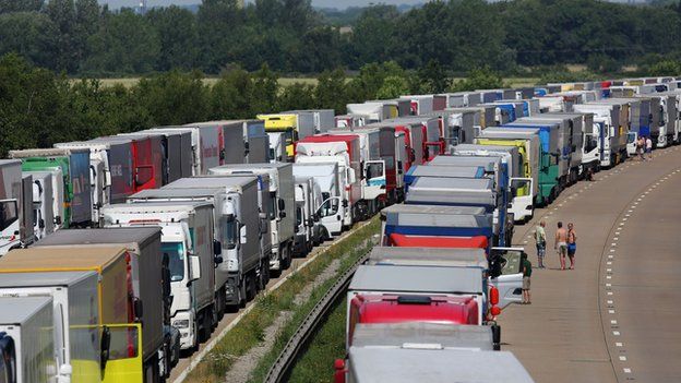 Lorries parked on both carriageways of the M20