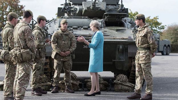 Theresa May talking to soldiers