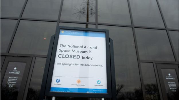 A sign outside the Smithsonian National Air and Space Museum states that the museum is closed because of a partial government shutdown in Washington, DC, January 2, 2019
