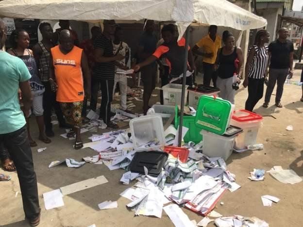 Destroyed ballot boxes in the Isolo district of the commercial capital, Lagos.