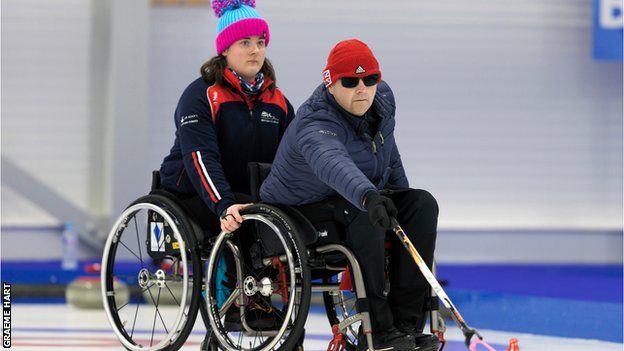 Gregor Ewan and Meggan Dawson Farrell during wheelchair curling training