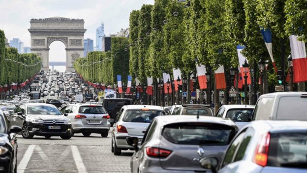 Vehicles on the Champs-Elysees avenue on May 13, 2017 in Paris