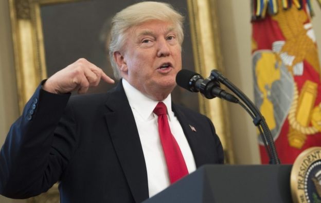 US President Donald Trump speaks about signing executive orders on trade policies in the Oval Office of the White House in Washington, DC, March 31, 2017.