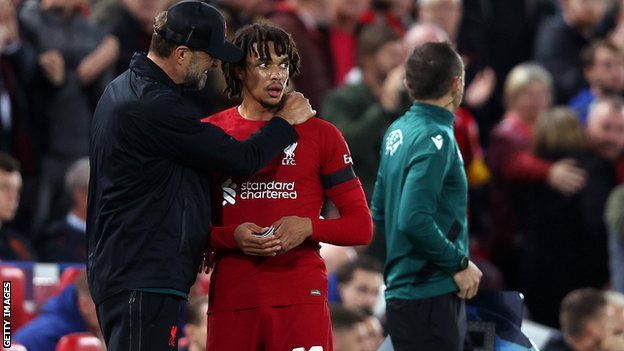 Jurgen Klopp (left) and Trent Alexander-Arnold