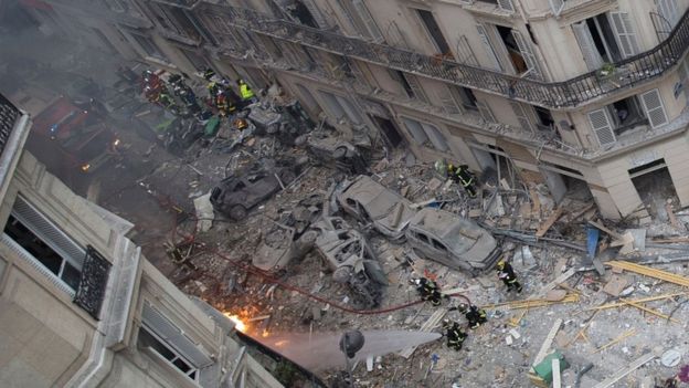 A general view shows debris and car wreckage following the explosion of a bakery on the corner of the rue Sainte-Cécile and rue de Trévise in central Paris on 12 January 2019