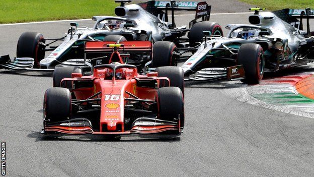 Charles Leclerc holds off the Mercedes of Valtteri Bottas and Lewis Hamilton