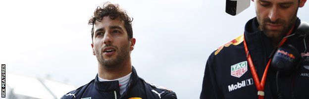 Daniel Ricciardo walks back to the pit lane