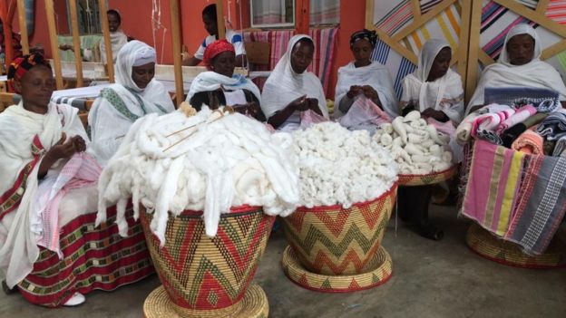 Women making traditional clothing