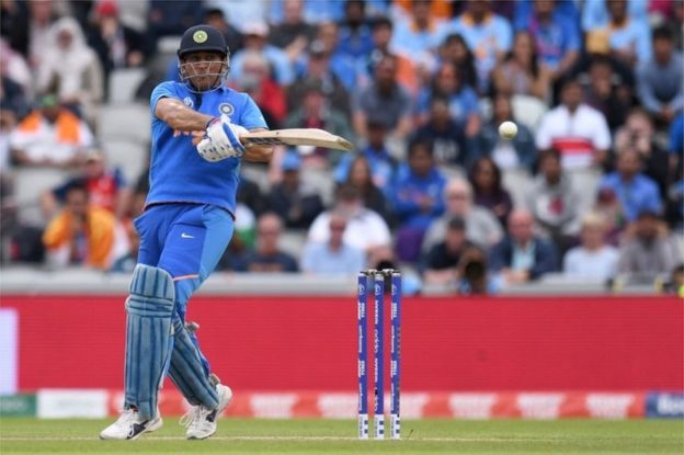 India"s Mahendra Singh Dhoni plays a shot during the 2019 Cricket World Cup first semi-final between New Zealand and India at Old Trafford in Manchester, northwest England in 2019