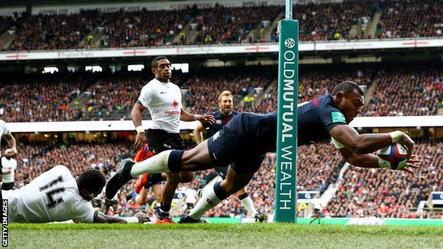 Semesa Rokoduguni dives over to score for England