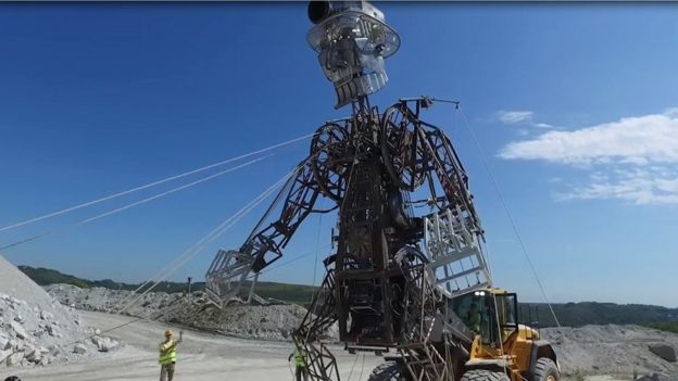 Giant miner puppet walks through Cornwall - BBC News