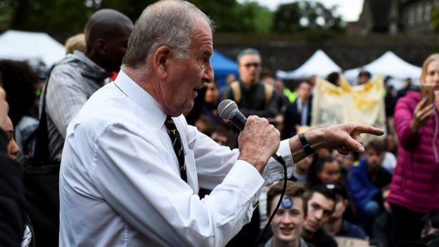 Roger Gale speaks to protestors outside of the Houses of Parliament in June.