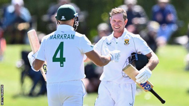South Africa opener Sarel Erwee (right) celebrates his maiden Test ton against New Zealand with team-mate Aiden Markram (left)