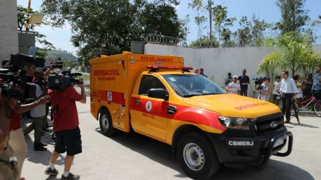 A civil defence vehicle transports a body after the fire in the training centre of Flamengo football club, in Rio de Janeiro, Brazil, 8 February 2019
