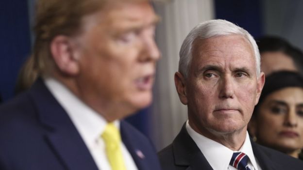 US President Donald Trump and VP Mike Pence are pictured at Monday's press briefing