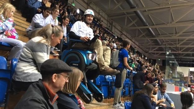 Contestant travels down stairs in Cybathlon