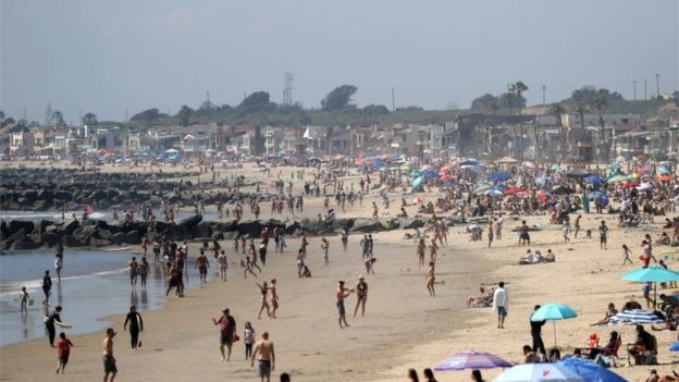 people at newport beach, orange county 25 april