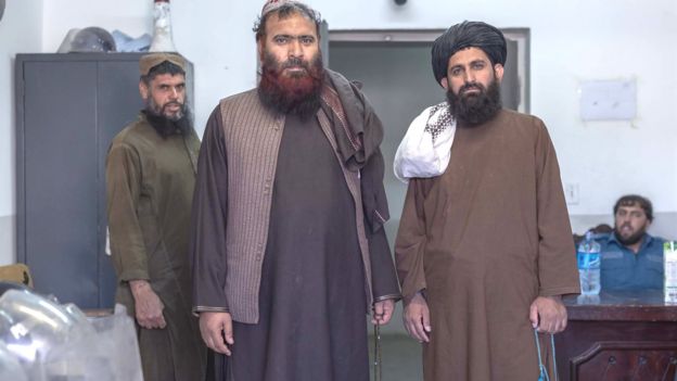 Mawlawi Fazel Bari (right) with another Taliban prisoner