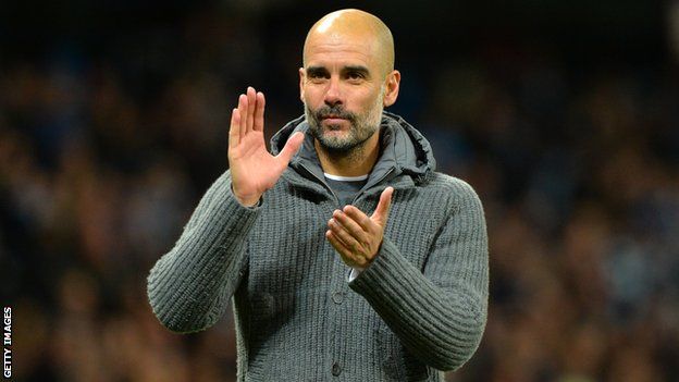 Manchester City manager Pep Guardiola applauds the crowd after a Premier League win