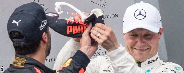 Valtteri Bottas turns down a 'shoey' from Daniel Ricciardo