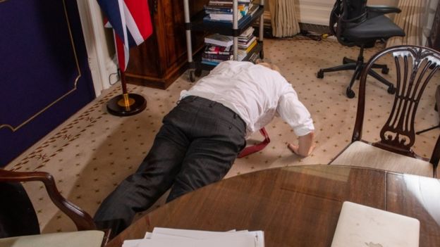 Boris Johnson does a press-up