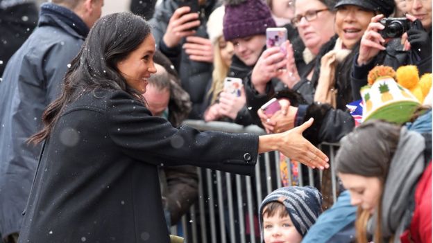 Meghan meeting crowds during a visit to Bristol