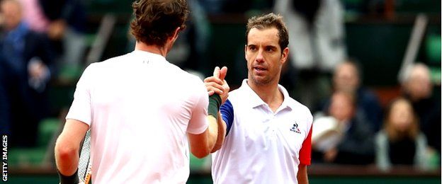 Andy Murray shakes hands with Richard Gasquet