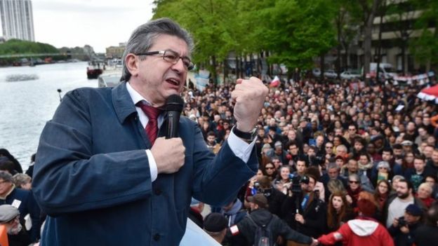 Jean-Luc Melenchon addresses his supporters from a barge. Photo: 17 April 2017