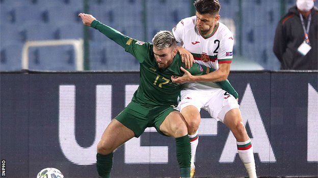 Aaron Connolly battles with Bulgaria's Ivelin Popov