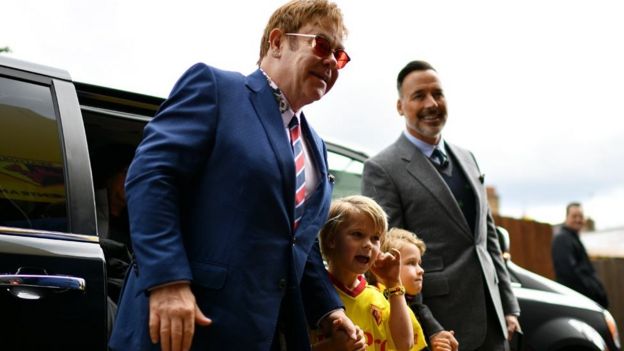 Elton John with his sons and husband David Furnish