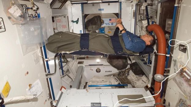 On the ISS, astronauts have to sleep tied to the wall - and they don't have any pillows