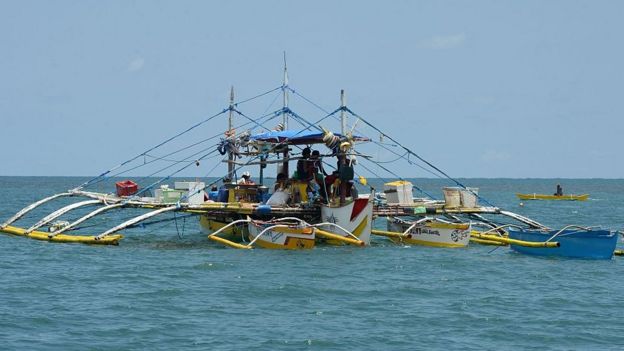 This photo taken on June 16, 2016 shows a fishing vessel anchored at the mouth of the South China Sea off the town of Infanta in Pangasinan province, as they wait for their fishing expedition to Scarborough Shoal.
