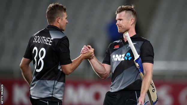 New Zealand captain Tim Southee (left) congratulates Jimmy Neesham (right) after victory over West Indies in the first T20