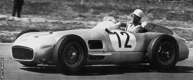 Stirling Moss in a Mercedes at the 1955 British Grand Prix