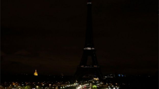 Eiffel tower pictured in darkness against Paris skyline on 24 November