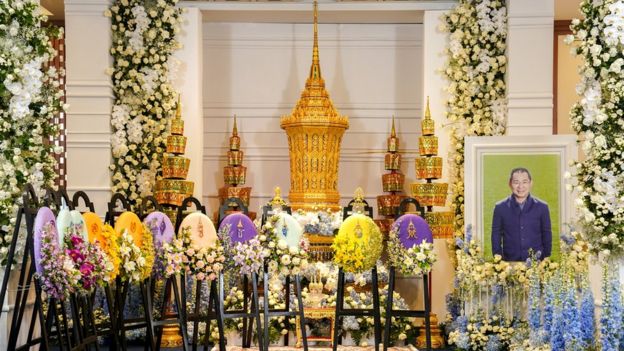 A picture of Vichai Srivaddhanaprabha, late chairman of Leicester City Football Club is placed next to his urn