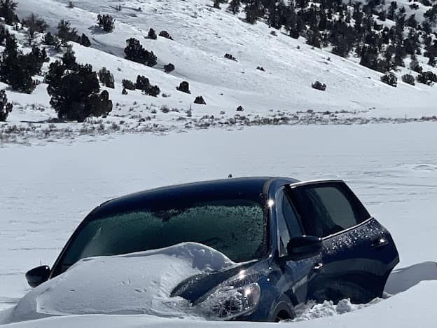 Jerry Jouret's car stuck in the snow