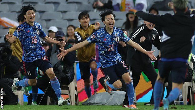 Kaoru Mitoma of Japan celebrates a goal
