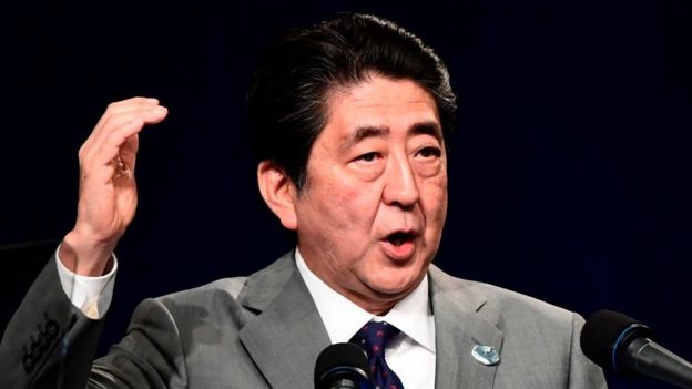 Japanese Prime Minister Shinzo Abe gives a press conference at the end of a G7 summit of Heads of State and of Government, on 27 May 2017 in Taormina, Sicily