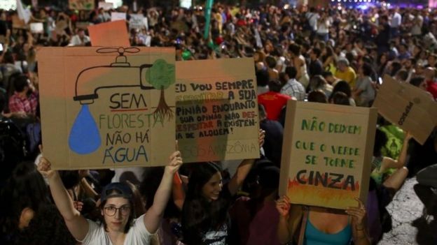 Activists demonstrate in front of the Environment Ministry in Brasília, 23 August 2019