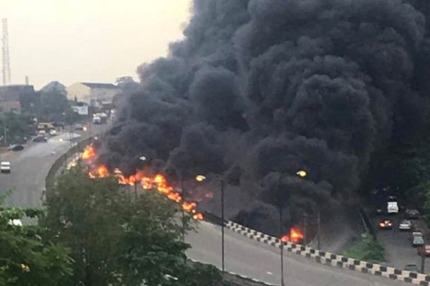 Smoke and flame rise after an oil tanker truck caught fire in Nigeria's commercial capital Lagos, 28 June 2018