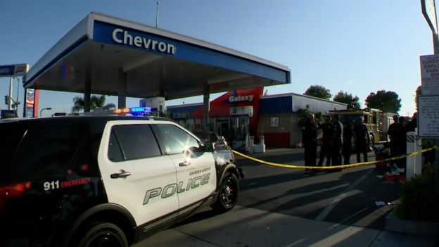 Police say the suspect drove to a gas station where he attacked a man pumping gas, nearly severing the victim's nose off his face.