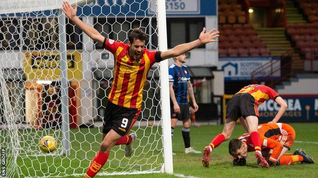 Brian Graham celebrates as Lewis Mayo's header finds the net at Firhill