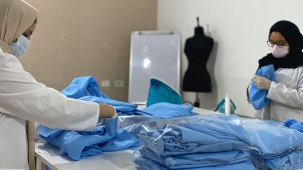 Fashion House volunteers making scrubs for medics in Tripoli, Libya