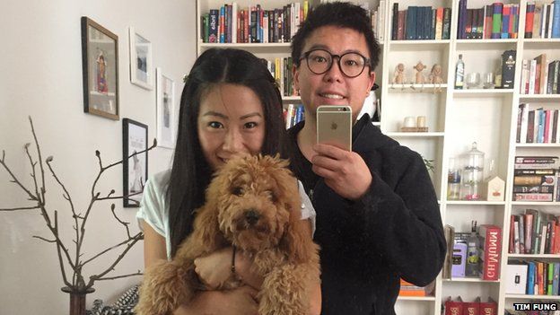Tim Fung with his fiancee and their dog